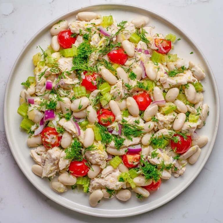 Serving suggestion for Lemony White Bean Chicken Salad, a Mediterranean-inspired, gluten-free main dish perfect for summer picnics or easy weeknight dinners.