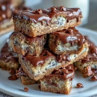 Festive Lucky Clover St. Patrick's Day cookie bars with green sprinkles and chocolate chips.